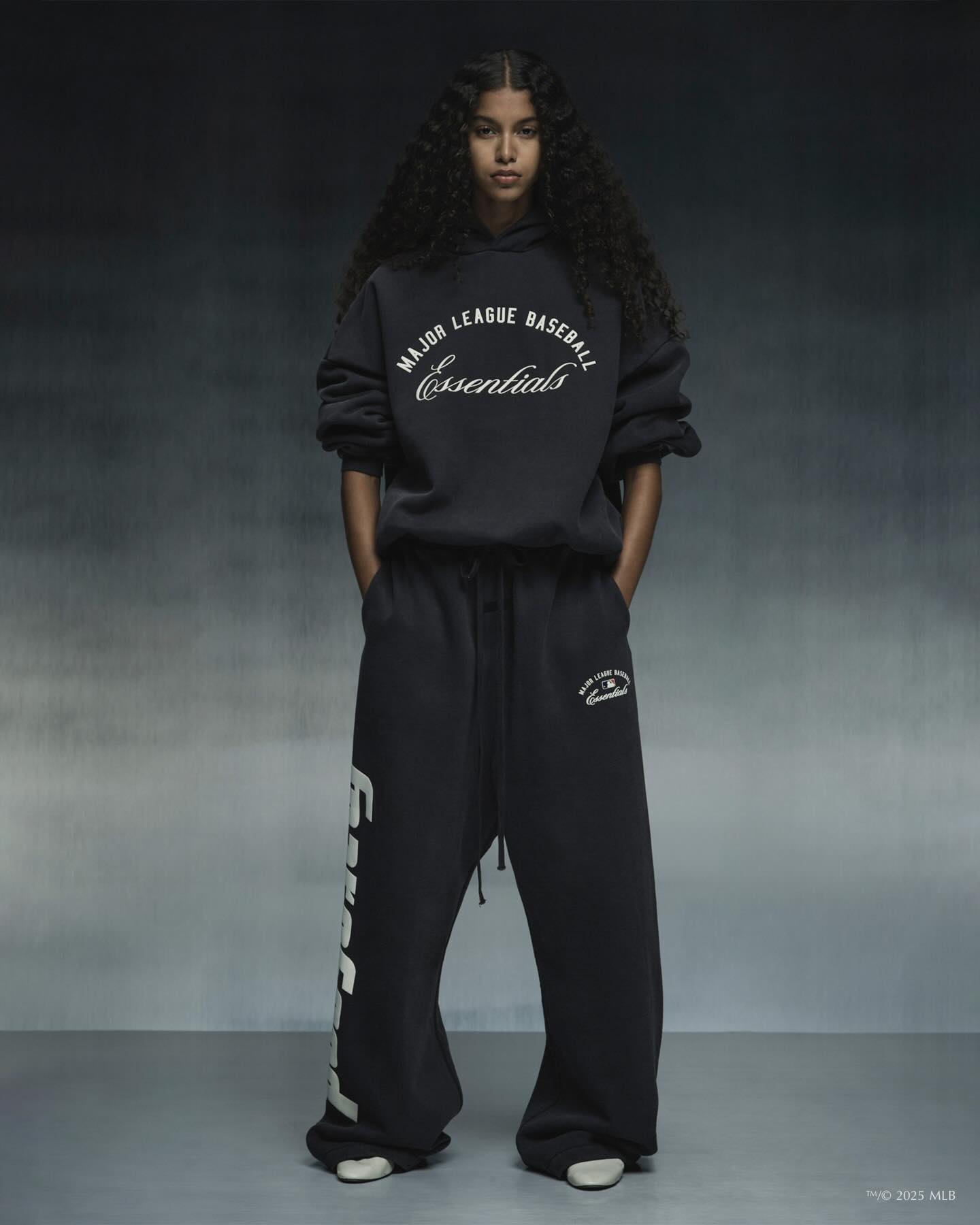 Black Essentials Hoodie A Timeless Piece in Modern Streetwear